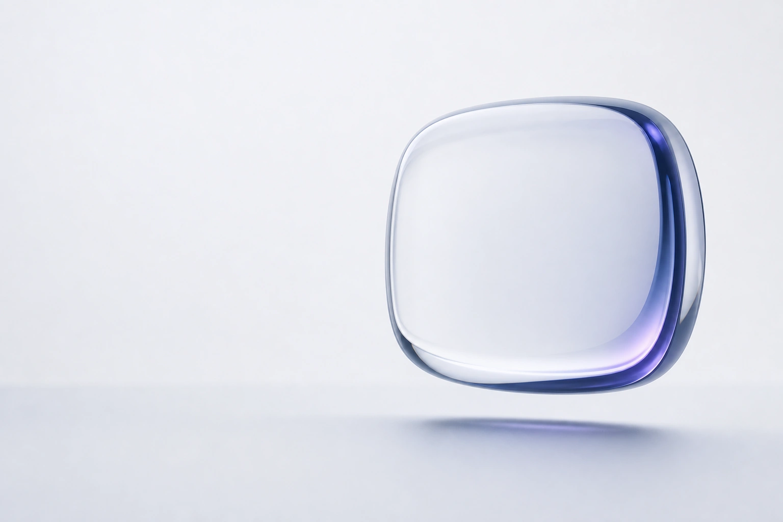A clear glass form with a soft blue edge