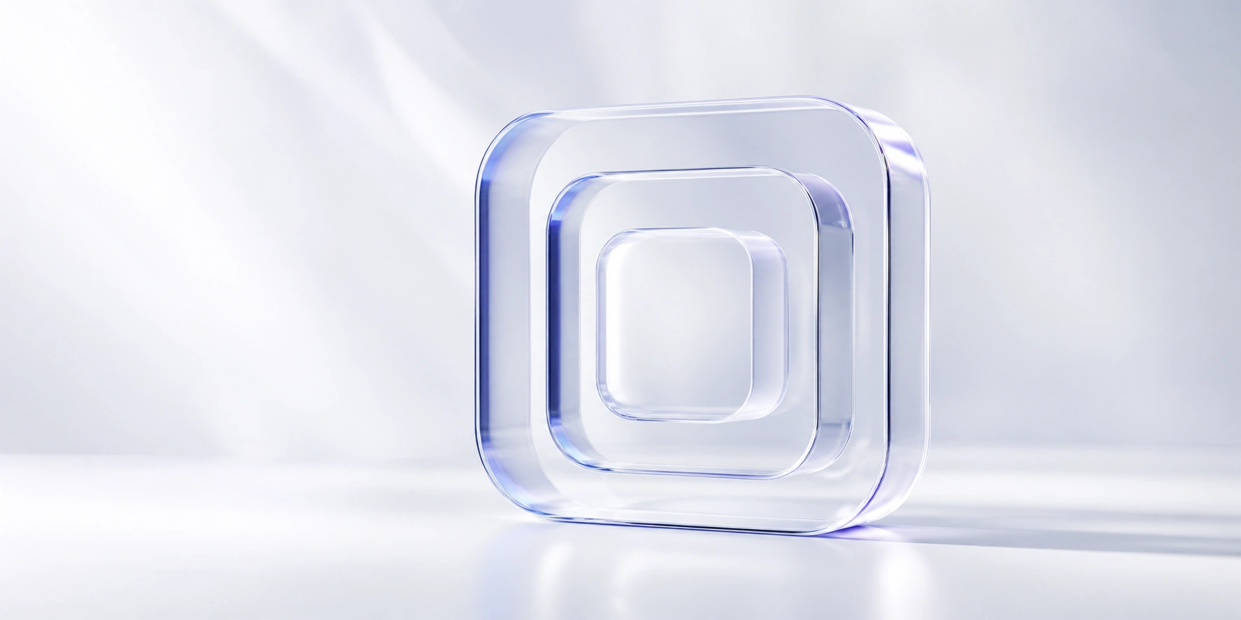 Nested translucent glass forms in soft blue light